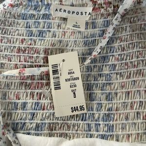 Brand new Aeropostale spaghetti strap dress. Size large.